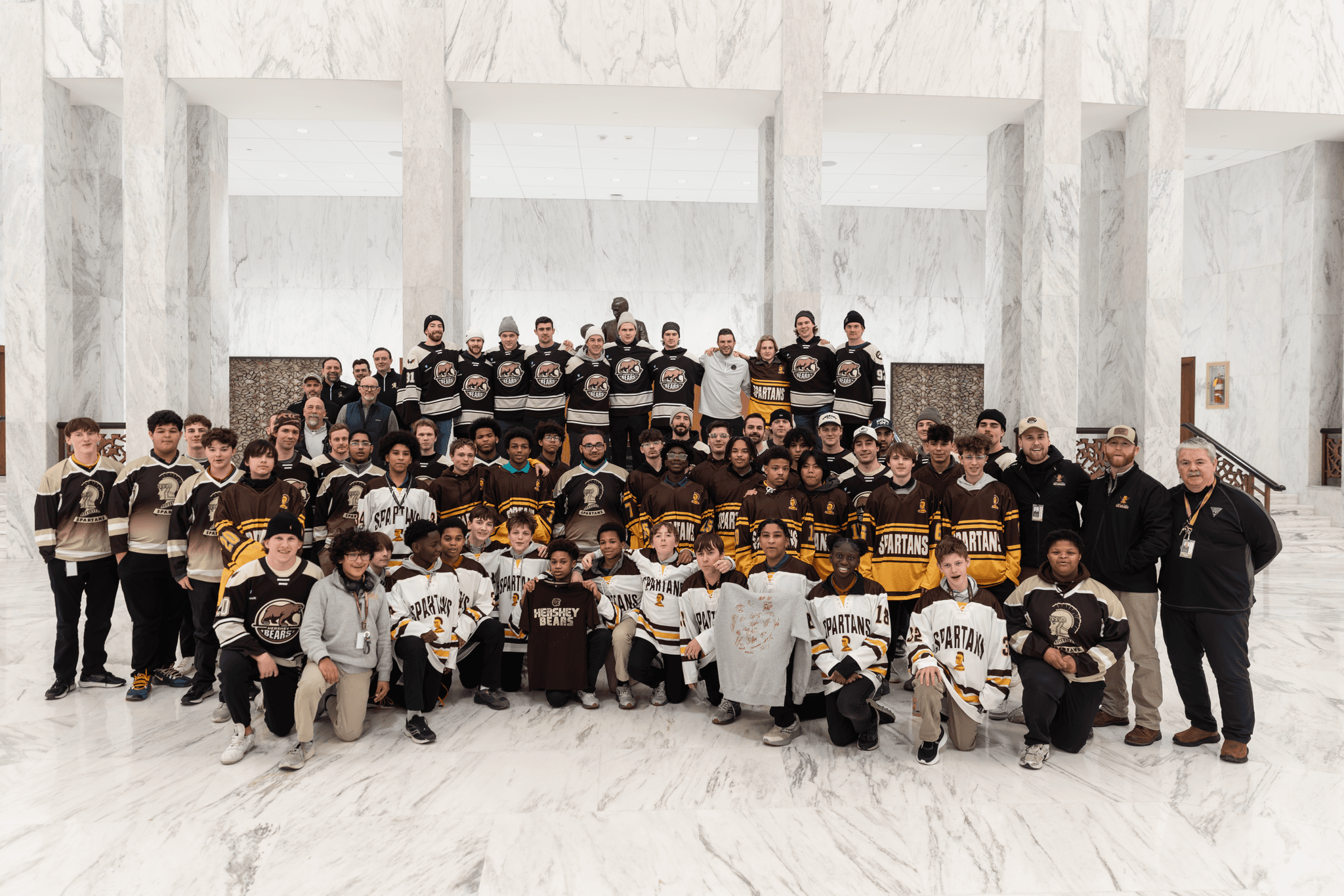 Hershey Bears players visiting the Milton Hershey School.