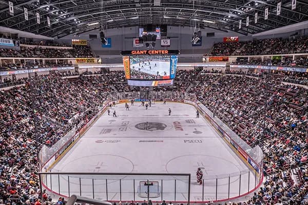 Interior of the GIANT Center showcasing a view from above of the hockey ice rink.
