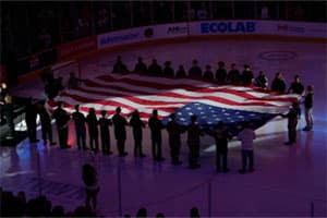 Color guard flag presentation at GIANT Center.
