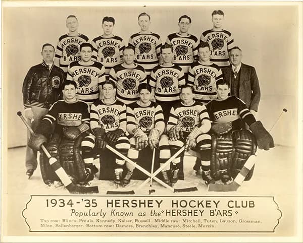 A historic black and white team photo of the 1934 Hershey Bears hockey team.