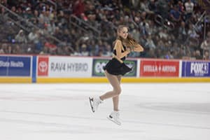 A figure skater performing during intermission at a Hershey Bears game.