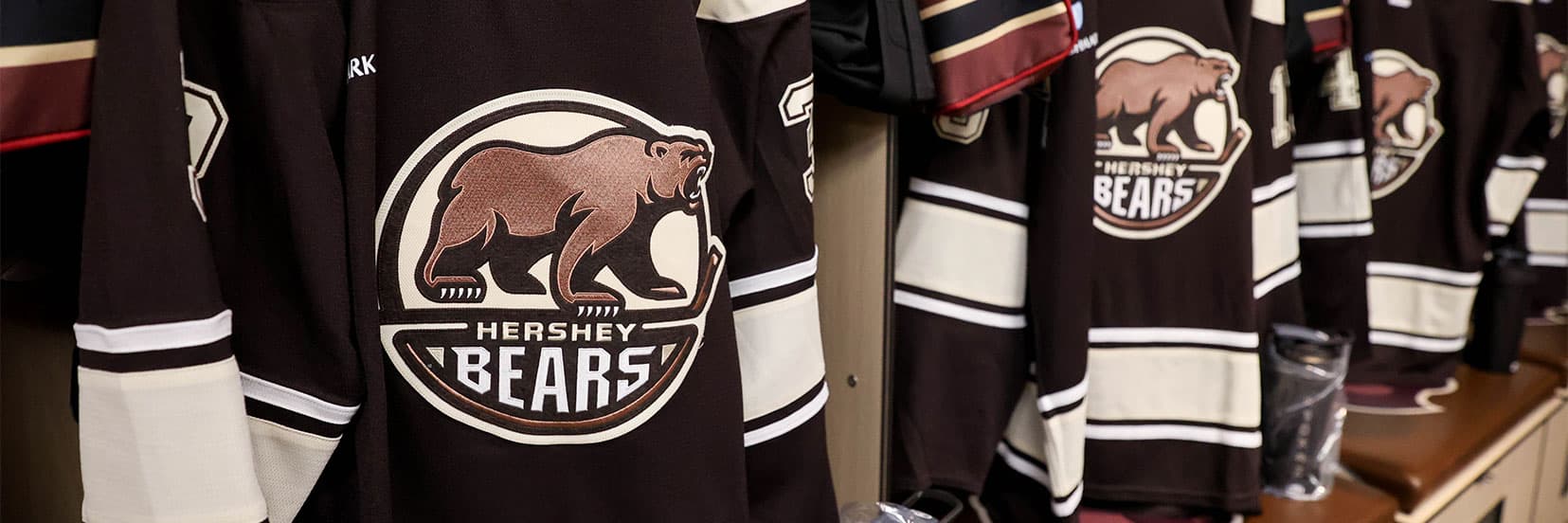 A close up of Hershey Bears hockey jerseys.